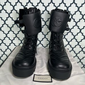 Gucci combat boots brand new, never used, in box and dust bag.